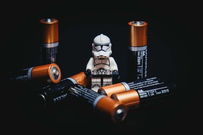 A row of battery cells standing on end, the power source for a small robot